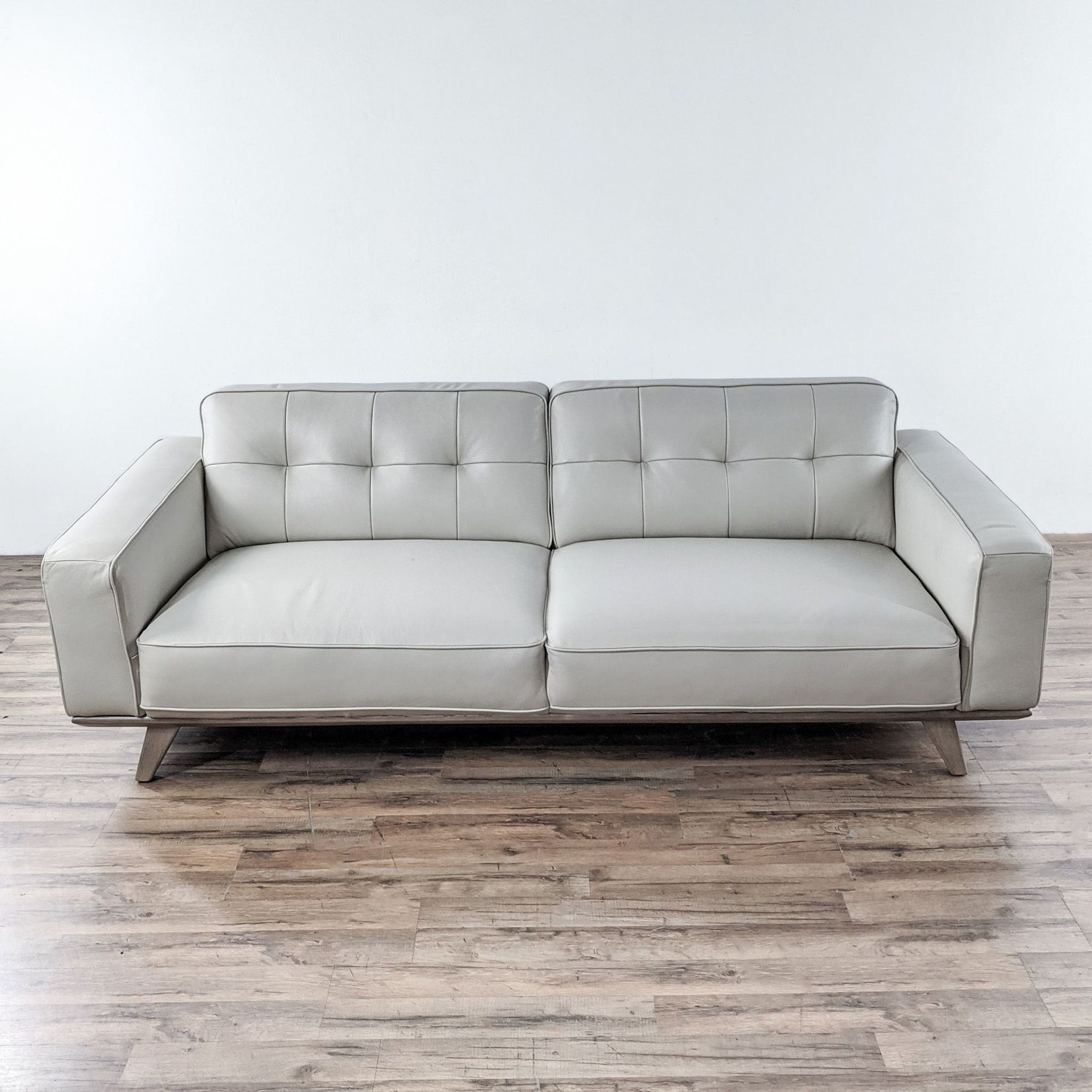 Living Spaces Caressa Leather Dove Grey Sofa - image 0
